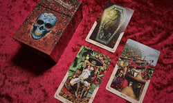 Santa Muerte Tarot - Back of box with gold foiling and various selection of cards