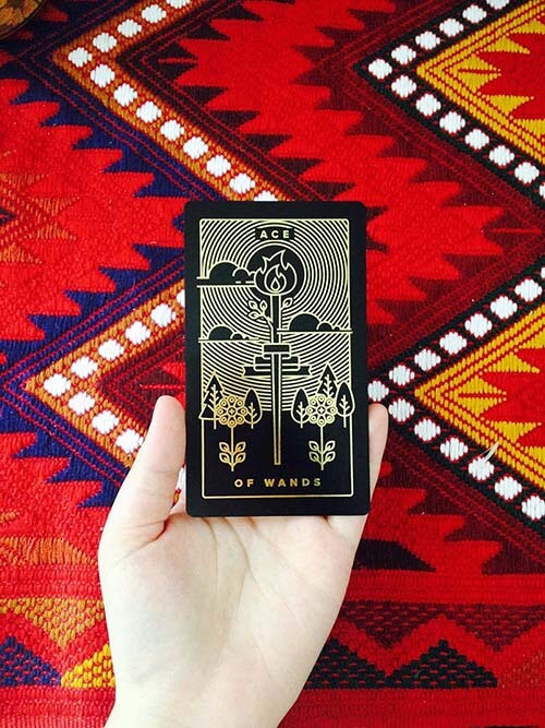 How to Read Tarot: The Ace of Wands represents passion, desire, and vitality.