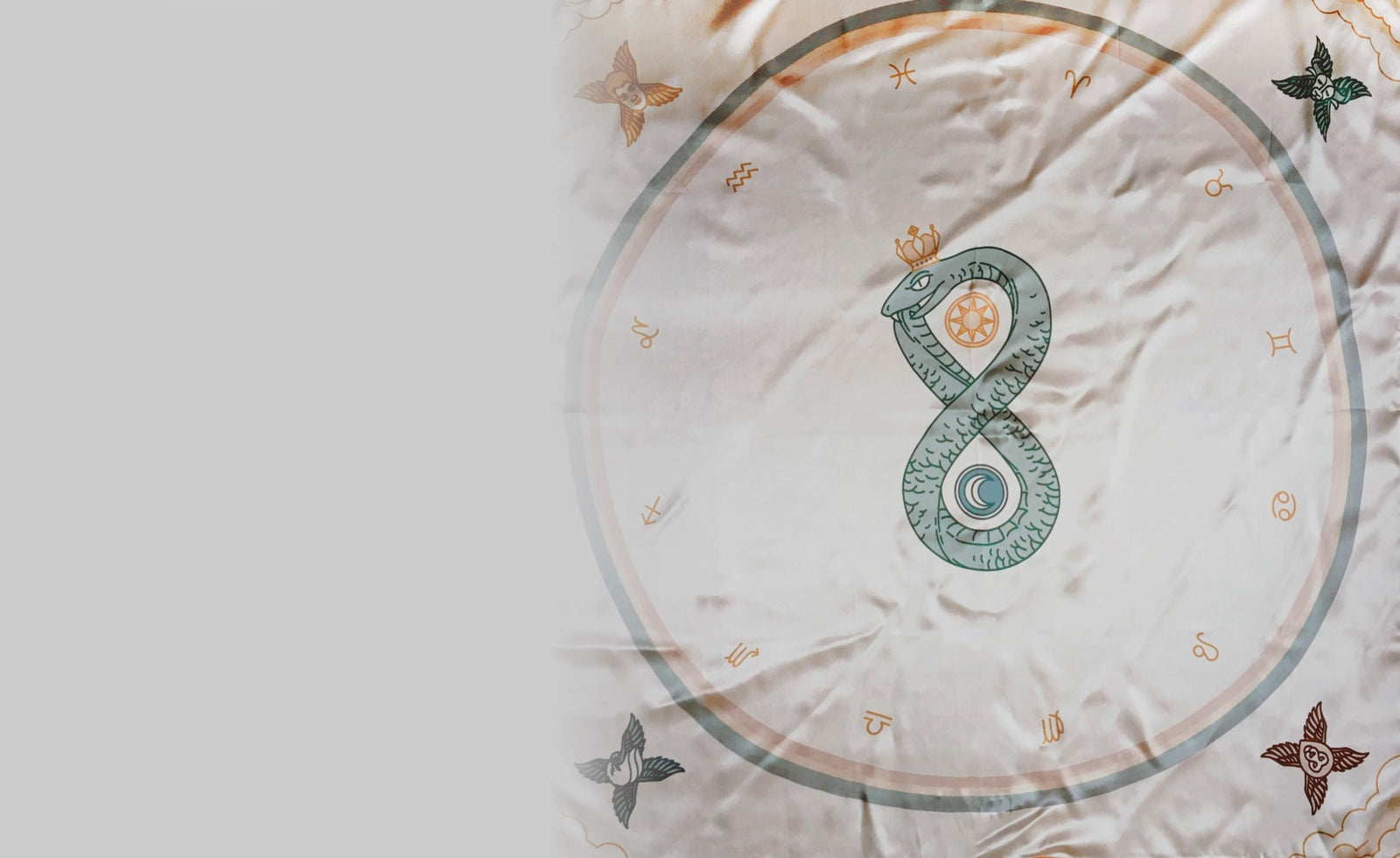 Tarot cloth companion for the Arcana Iris Sacra and Claves Astrologicae. Featuring coiled serpent, dualities, elements, and zodiac signs for intuitive placement of tarot cards.