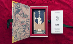 Arcana Iris Sacra Tarot Deck - Open box with instructional foldout and ribbon