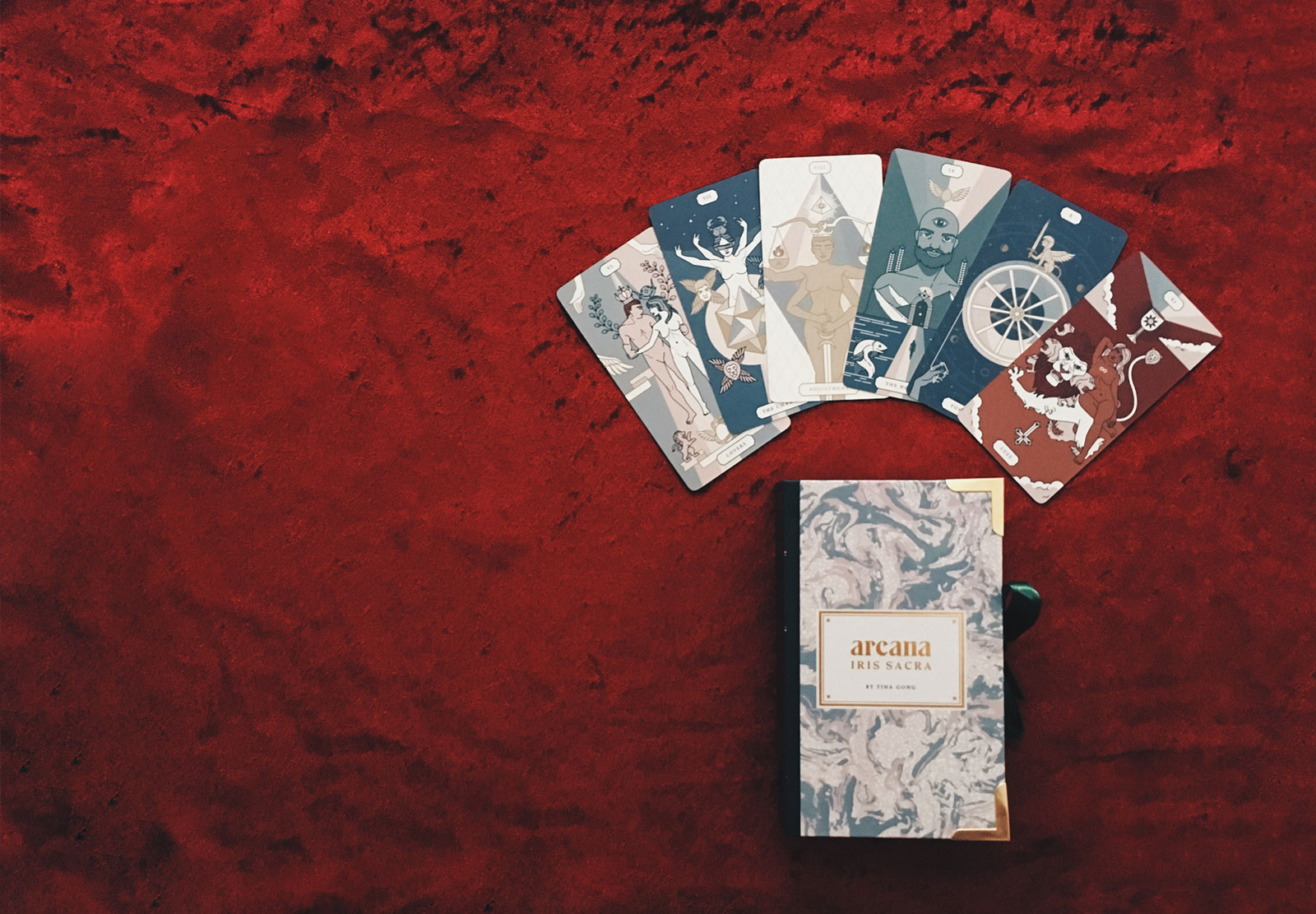 A gilded edge tarot deck based on the language of color, the tree of life, and the tradition of the Golden Dawn. 4 colors represent the 4 elements, and a rainbow represents universal energy, creating a simple framework for reading.