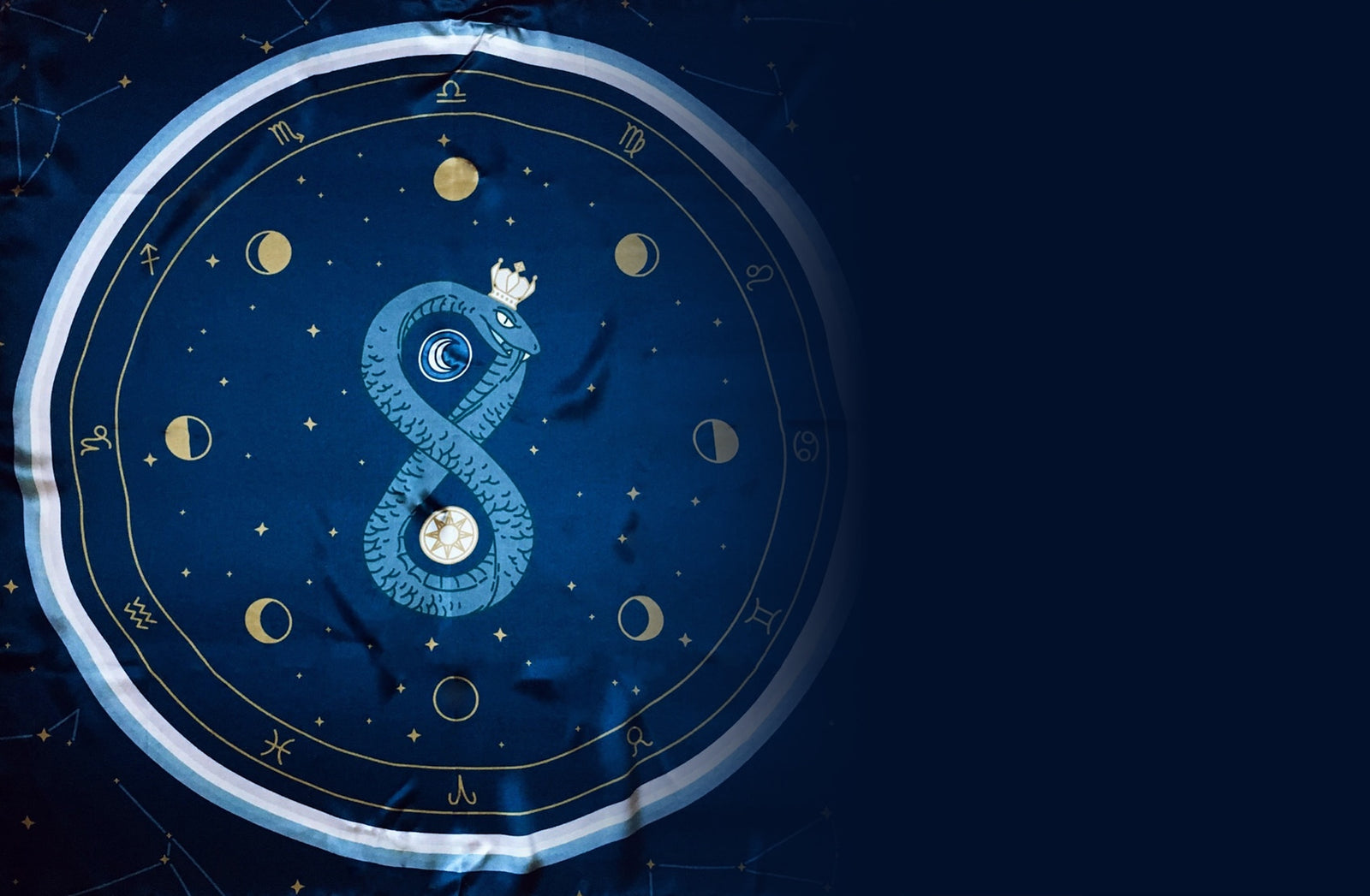 Tarot cloth companion for the Arcana Iris Sacra and Claves Astrologicae. Featuring coiled serpent, dualities, moon phases, and zodiac signs for intuitive placement of tarot cards.