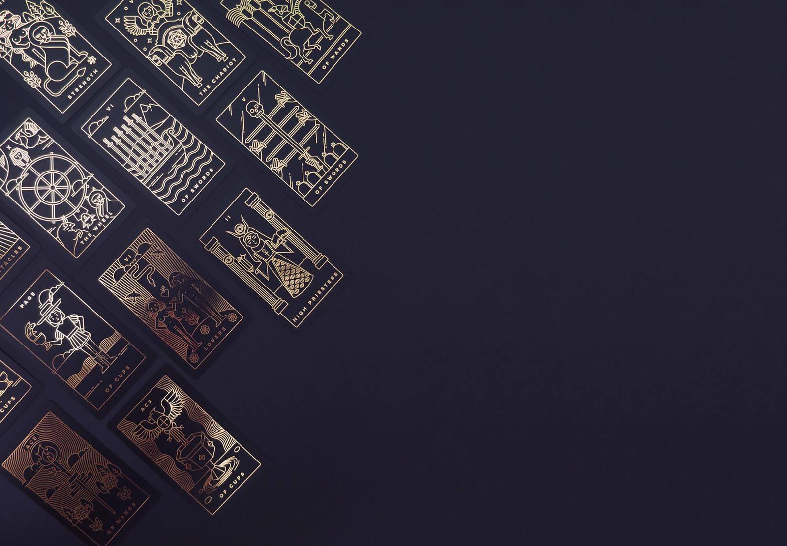 A minimalist iconographic tarot card deck printed with gold foil on sleek, matte, recycled plastic.